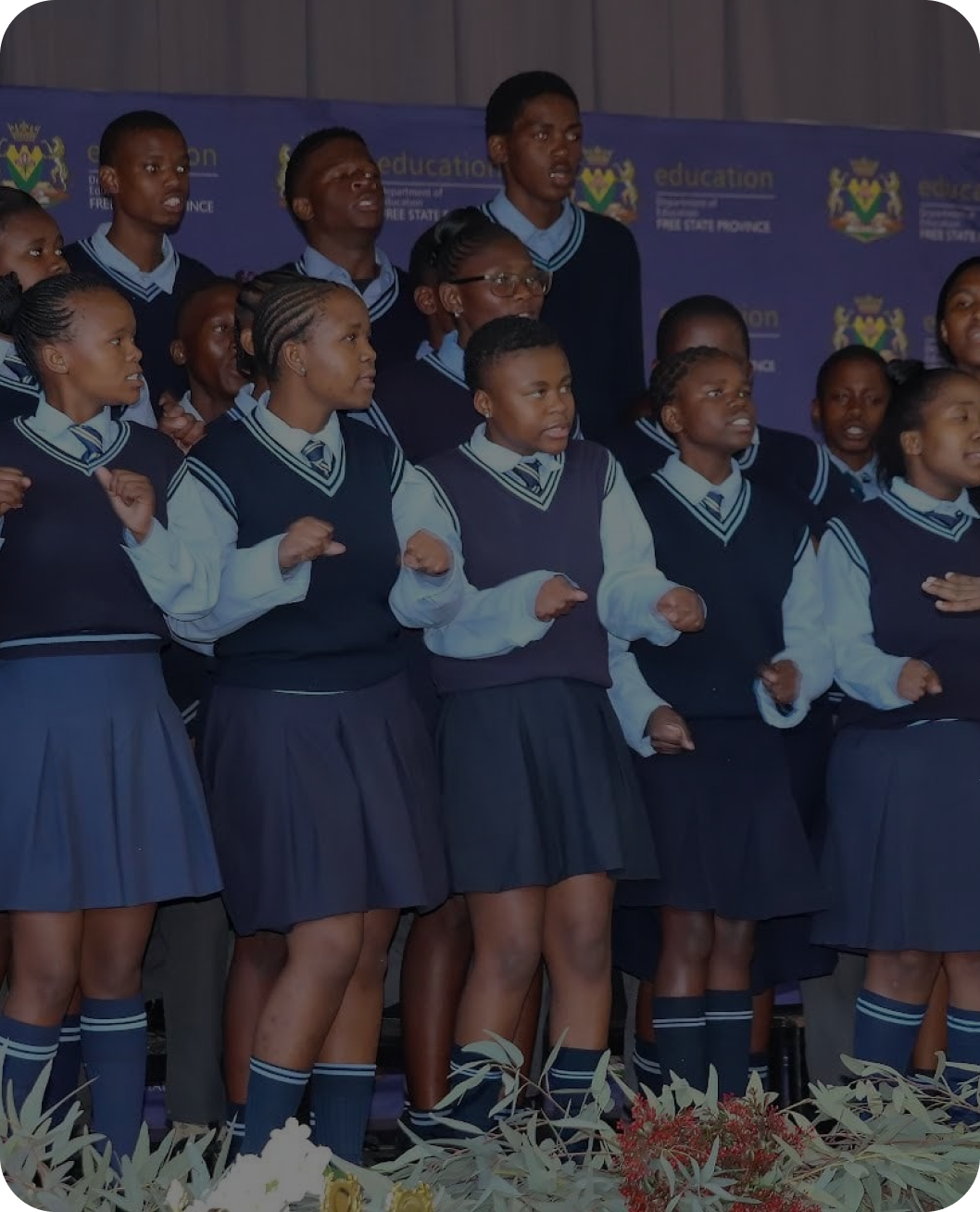 Group of students in school uniforms standing together